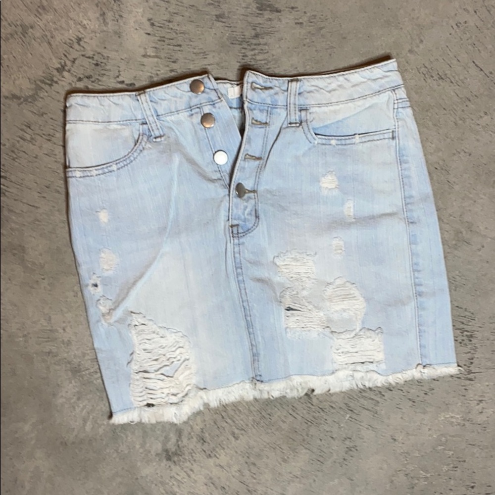Ripped Jean skirt. High waisted. Multiple buttons
